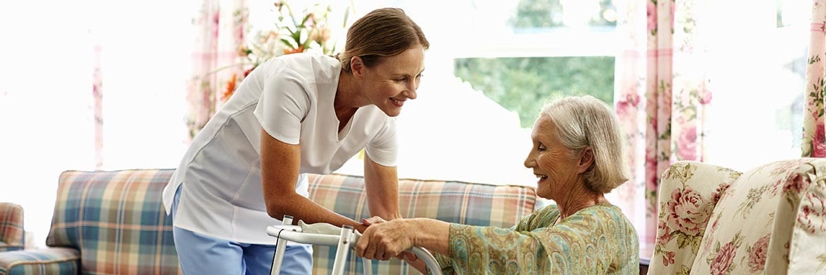 TLC Your Way Home Care Services | York County, Marion County, Florence / Darlington County | caregiver helping elderly woman with walker in her home