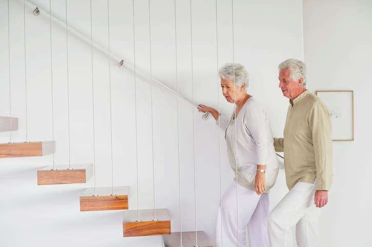 TLC Your Way Home Care Services | York County, Marion County, Florence / Darlington County | senior couple climbing stair case in their home