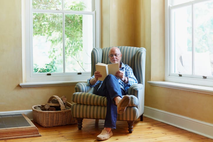 TLC Your Way Home Care Services | York County, Marion County, Florence / Darlington County | senior man reading book in home