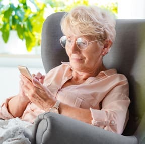 TLC Your Way Home Care Services | York County, Marion County, Florence / Darlington County | elderyly woman checking phone